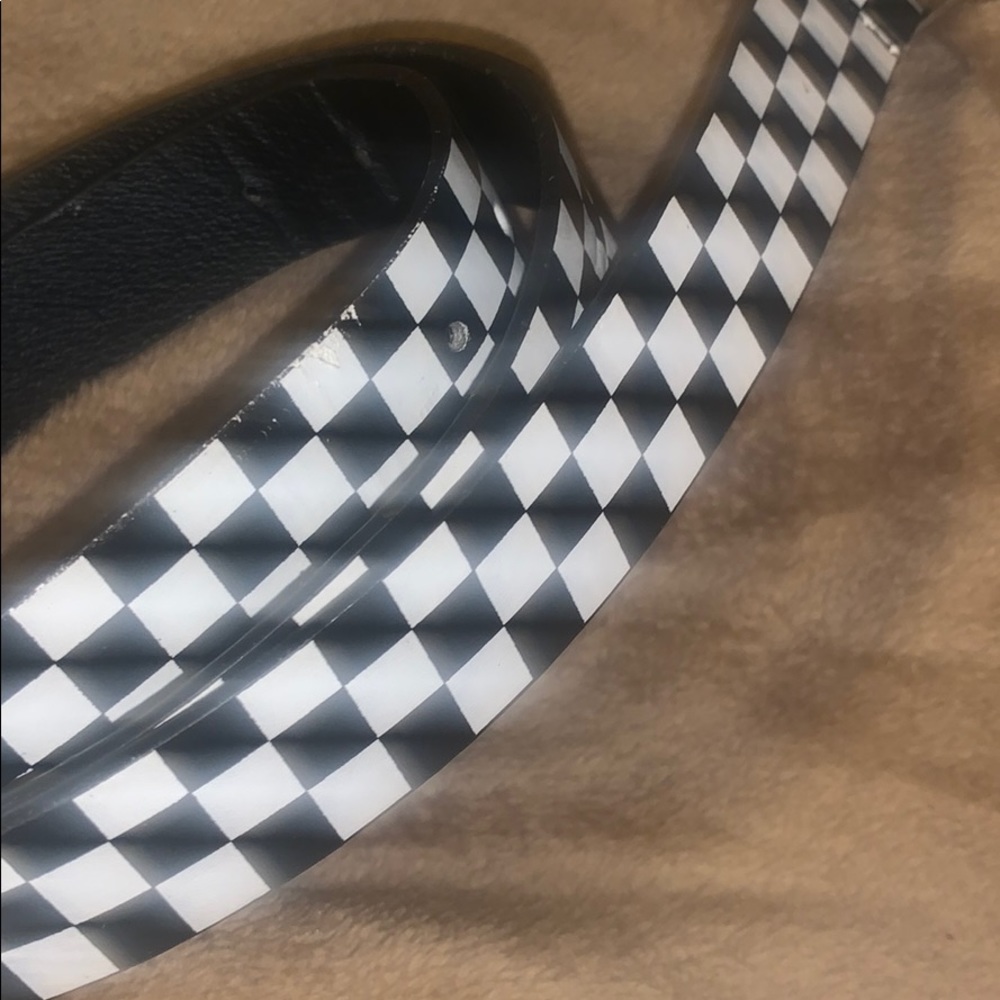 A black and white checkered van belt